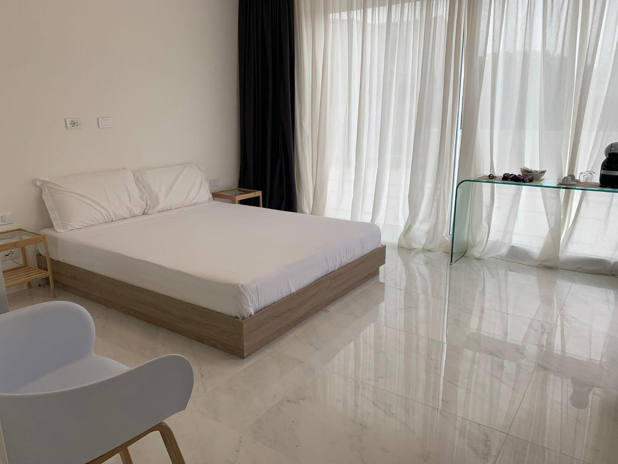 Smart Luxury Suites & Apartments Орозей Номер фото